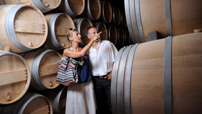 couple in winery, France